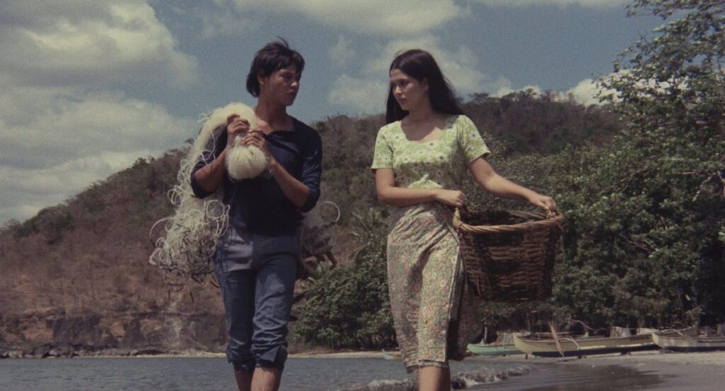 Julio Madiaga (Bembol Roco) and Ligaya Paraiso (Hilda Koronel) in a scene from "Manila in the Claws of Light"