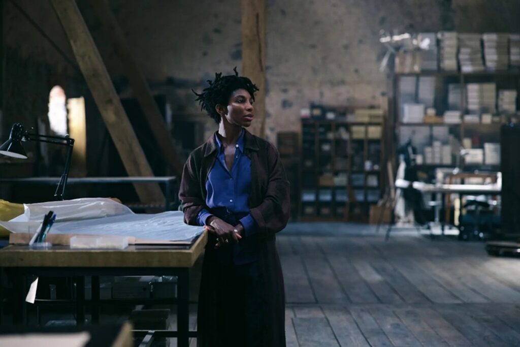 Michaela Coel portrays fashion designer Sam Anselm.