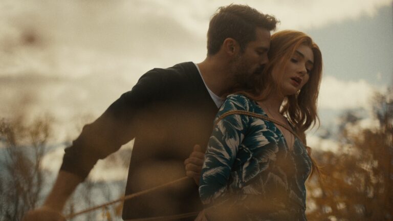 Brant Daugherty (left) and Emily Robinson in a scene from "By the Roots."