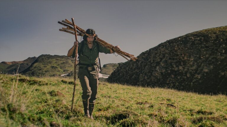 ‘Ceremony’ imagineNATIVE 2026 Review: When a Missing Fish Opens Up a Nation’s Memory Kmalsuuncw Orden Mack carries wood along the grease trail.
