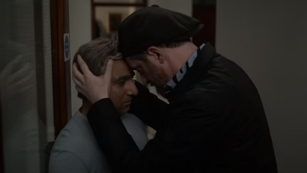 Beard forgives Nate, in a scene from the television series 'Ted Lasso'.